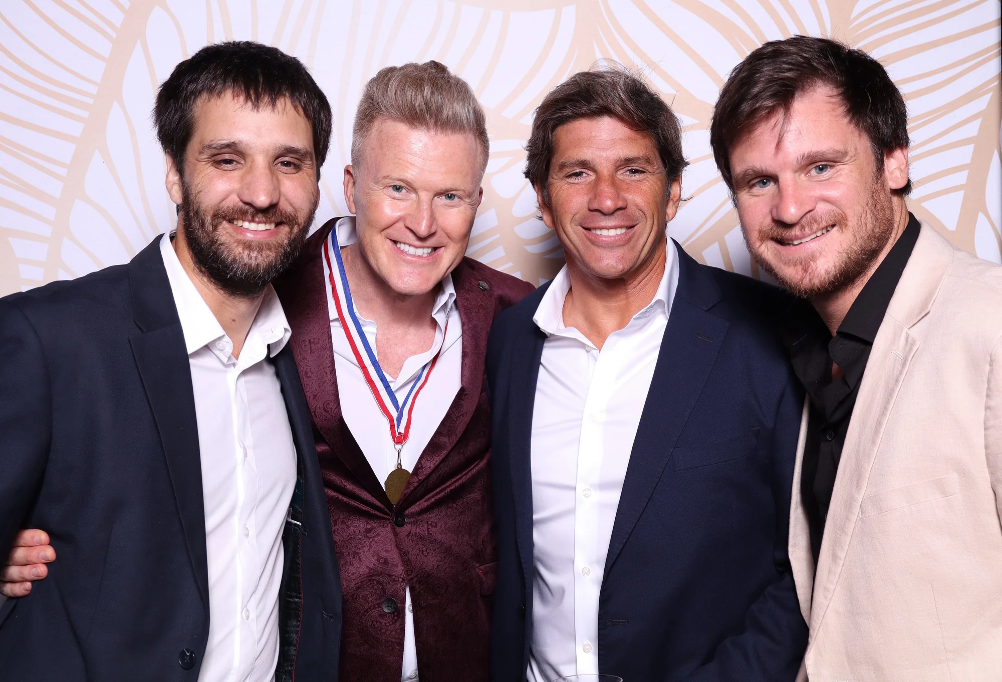Corporate dinner guests at a branded RicheMoments photo activation
