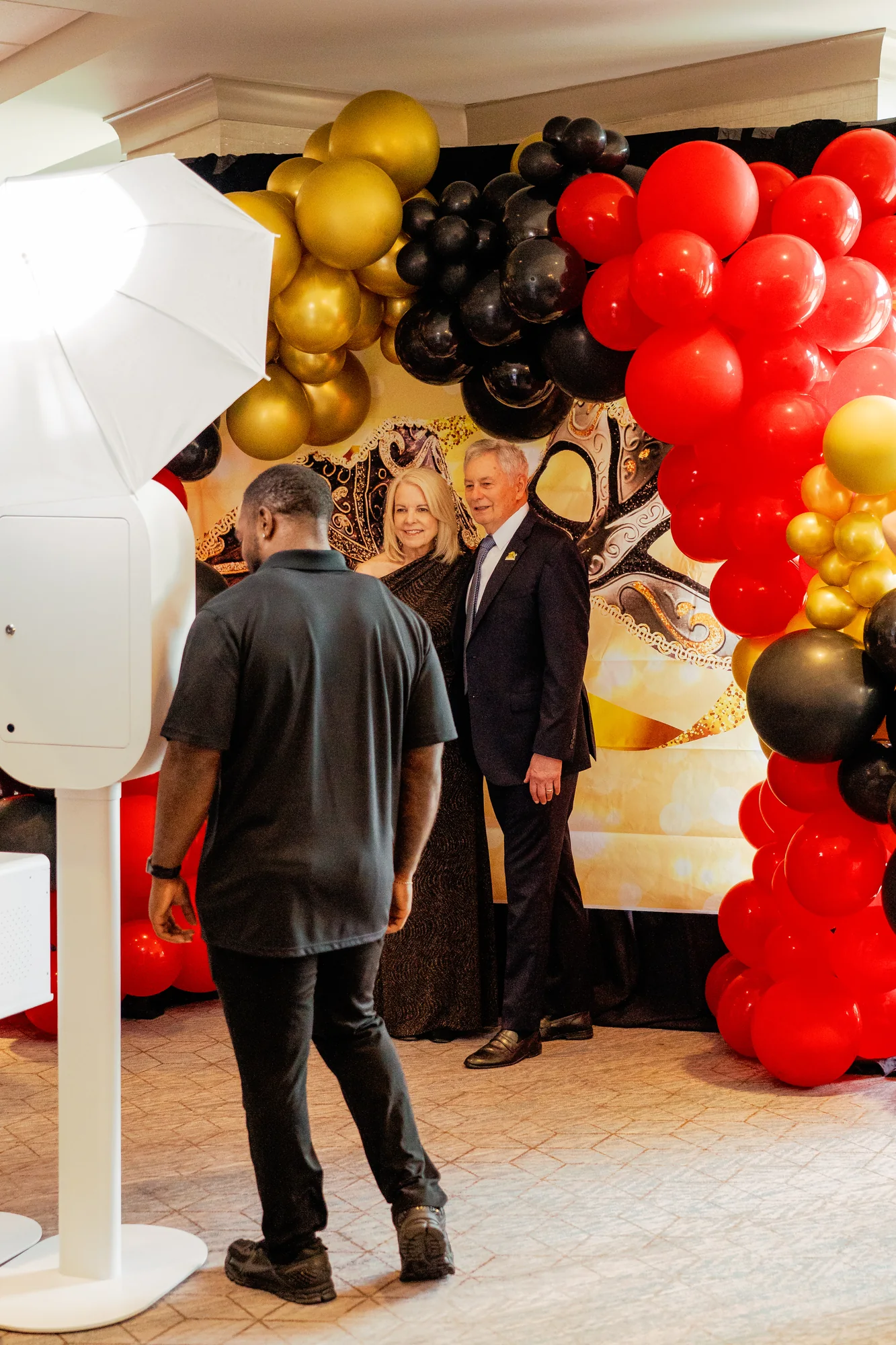 RicheMoments attendant guiding guests through the photo booth experience