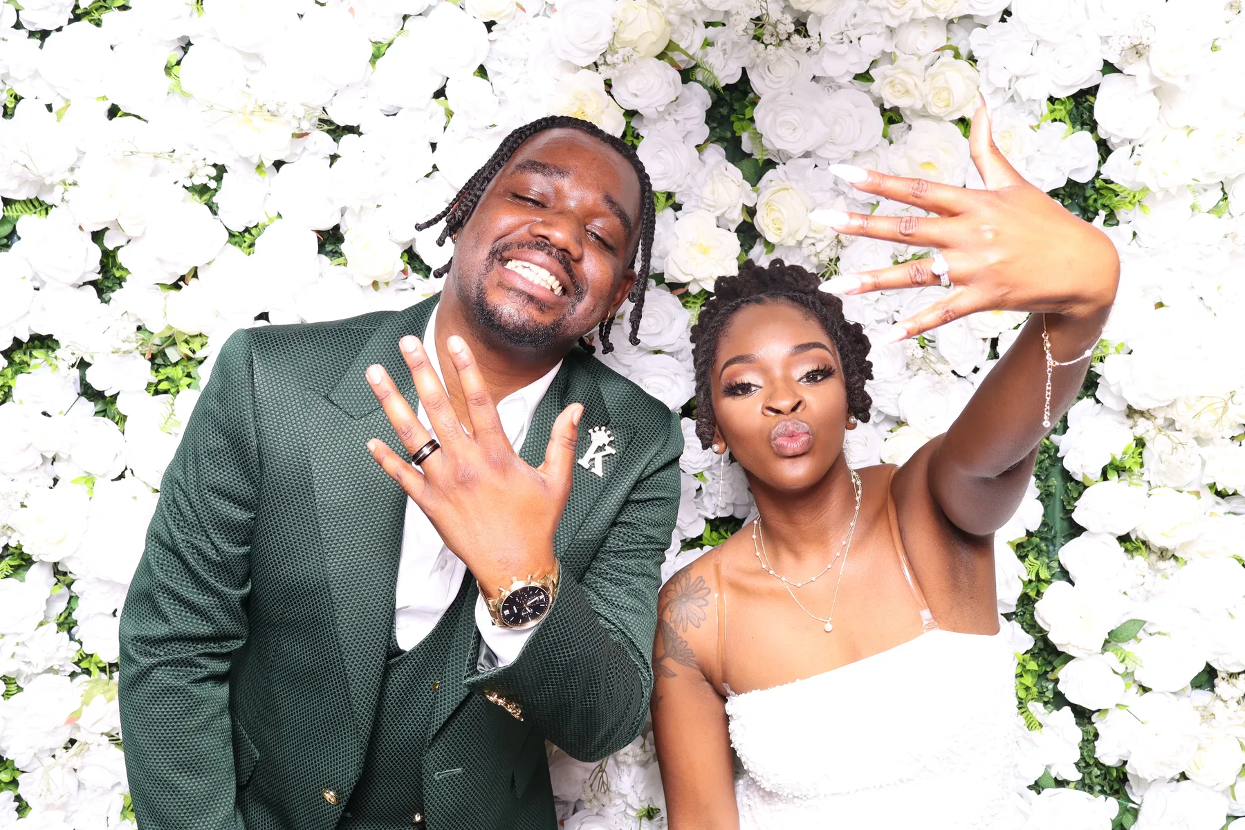 Newlyweds celebrating at the Kris and Jalissa wedding photo booth