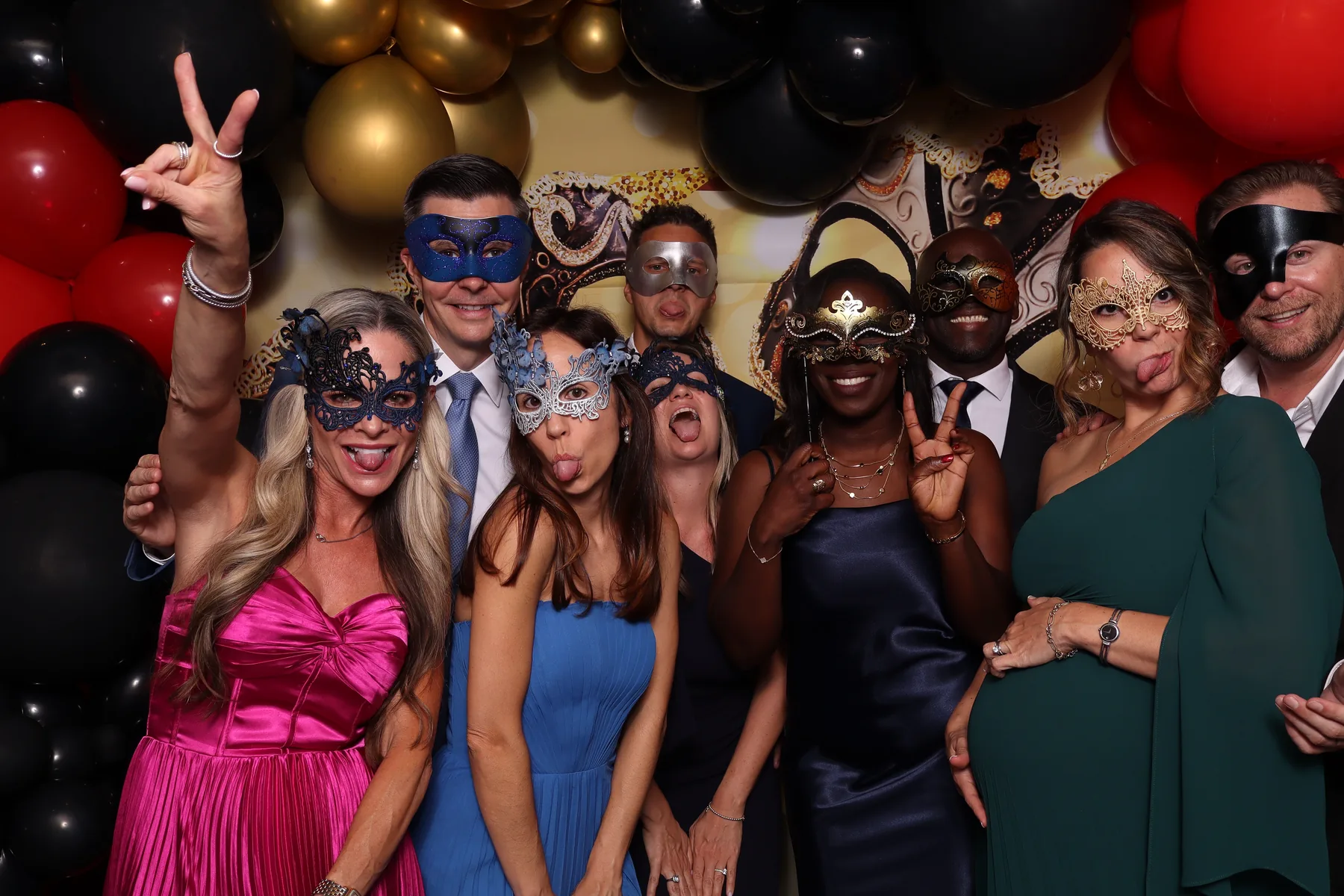 Guests celebrating at the Kids House gala photo booth
