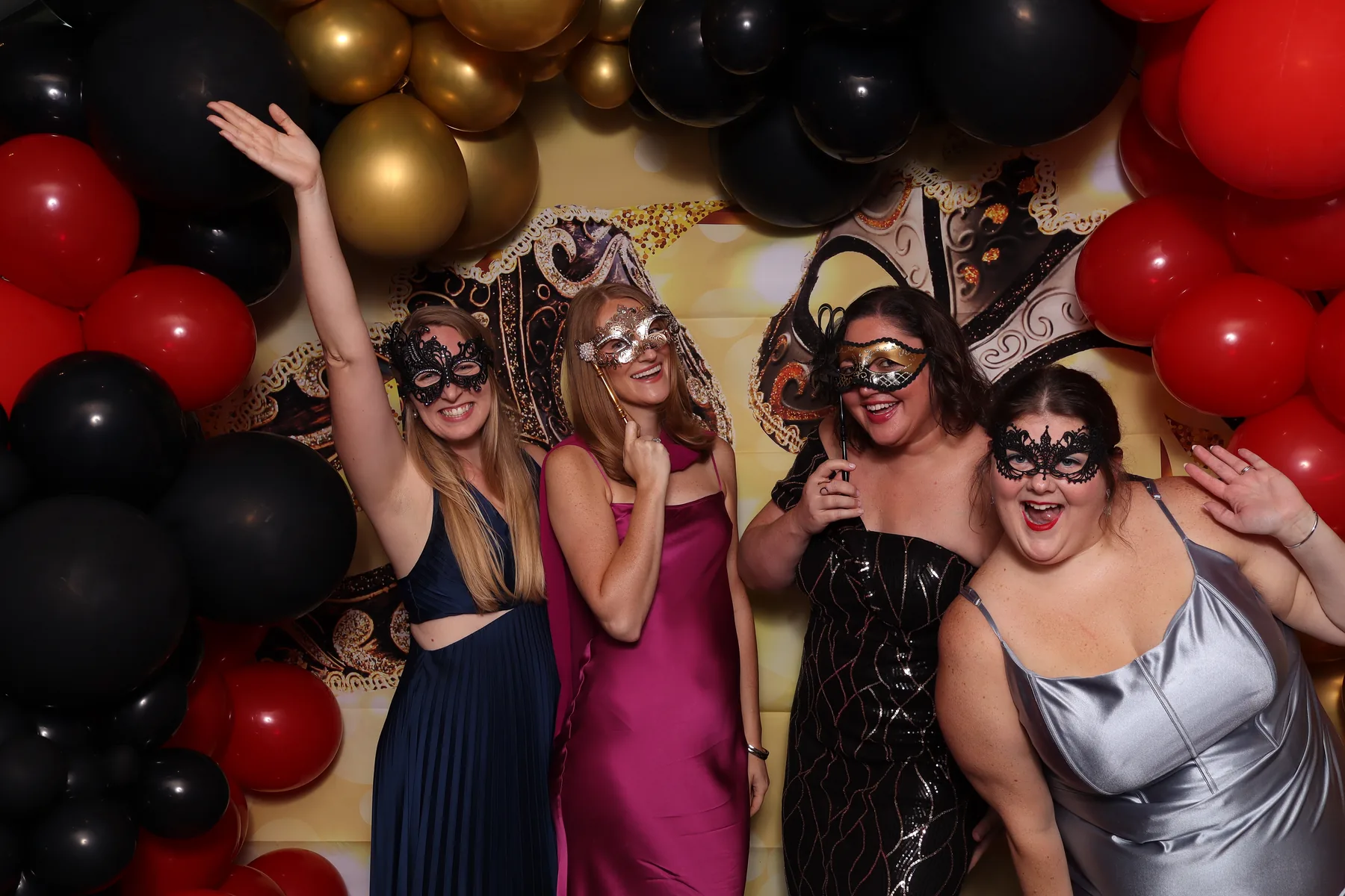 Guests enjoying the Kids House gala photo booth