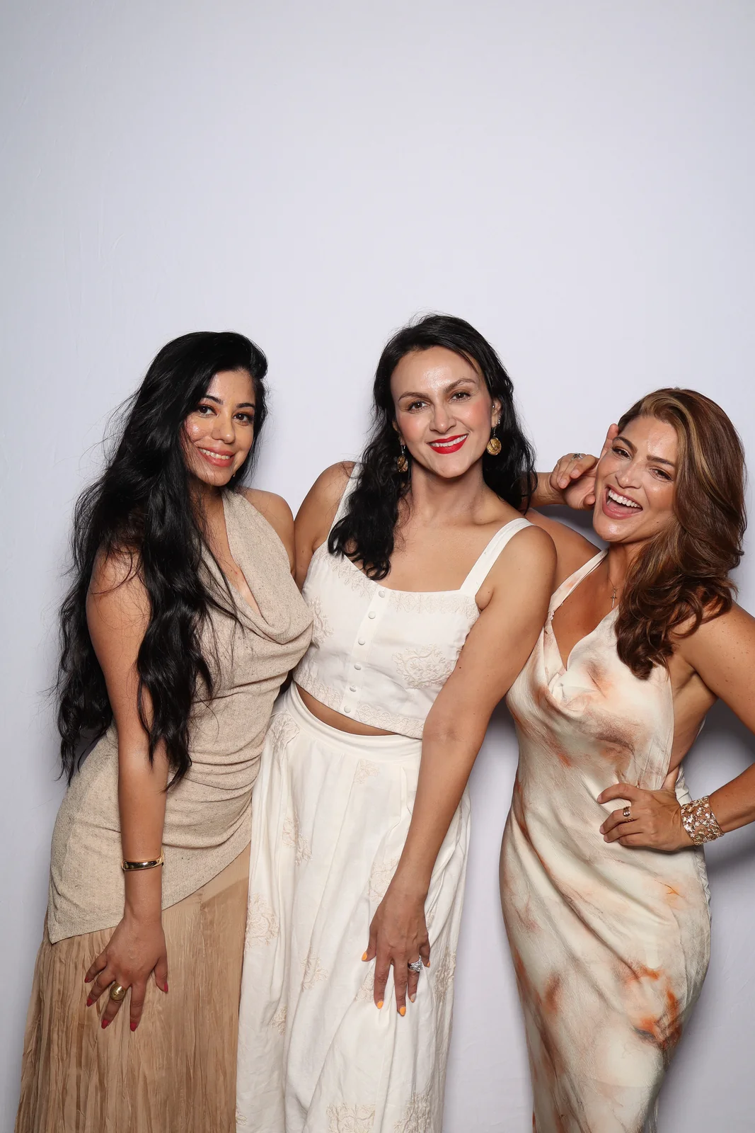 Guests at an elevated Summer Issue Launch Soirée photo booth activation